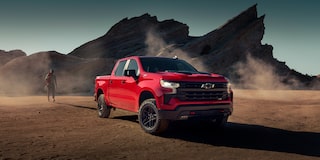 2024 Chevrolet Silverado Pickup Truck Three-Quarters View Parked by  Mountains