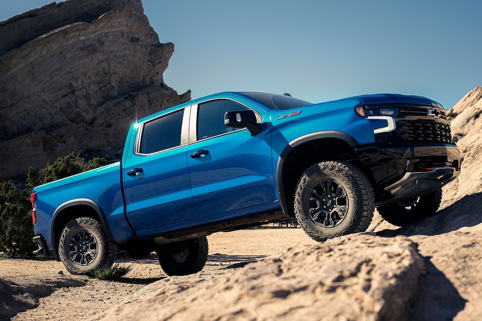 2024 Chevrolet Silverado 1500 Pickup Truck Driving Over Rough Terrain