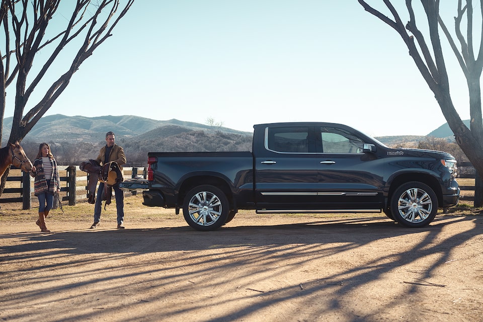 A Couple Loading up Their Horse Riding Equipment into Their 2024 Silverado