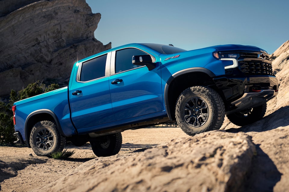 2024 Chevrolet Silverado 1500 Pickup Truck Driving Over Rough Terrain