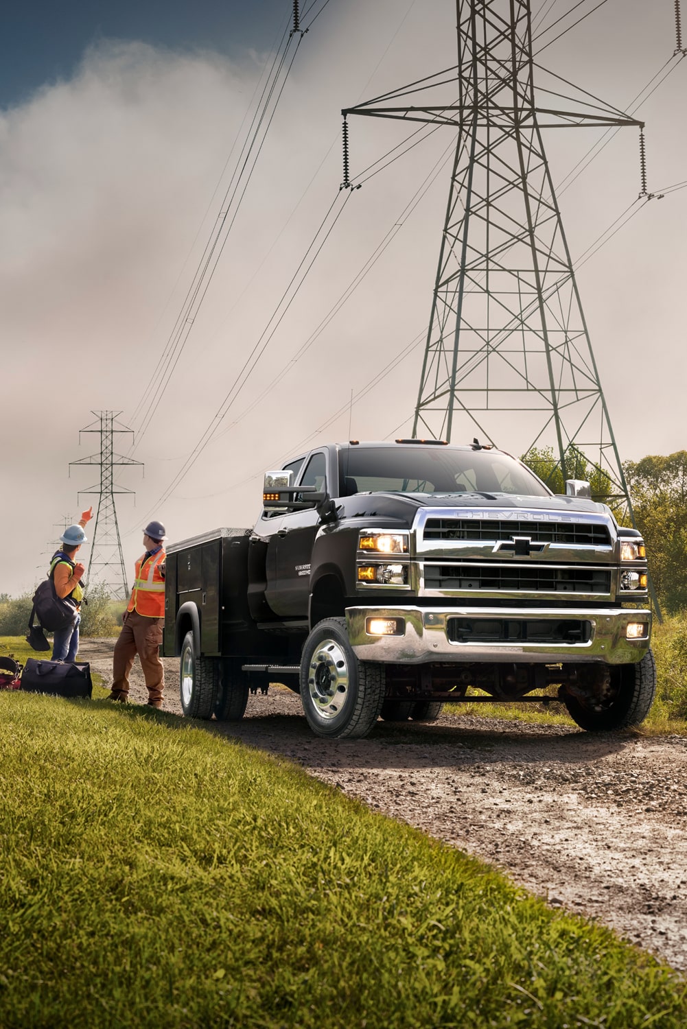2025 Chevy Silverado Medium Duty Chassis Cab Parked Near Electrical Lines Needing Inspection