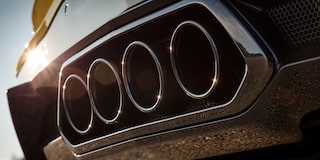 Close-up of the Rear Exhaust of a Chevy Corvette Z06 Shining in Sunlight