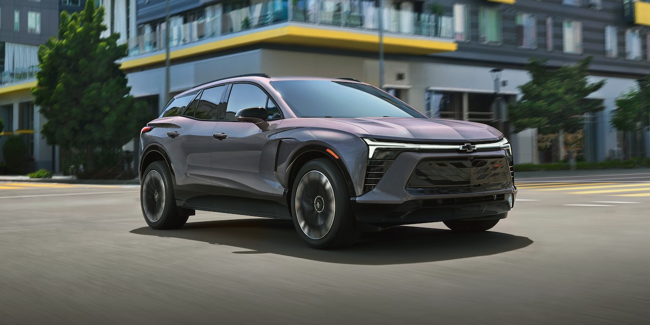 Three Quarters View of a 2025 Chevy Blazer EV in Front of a Building