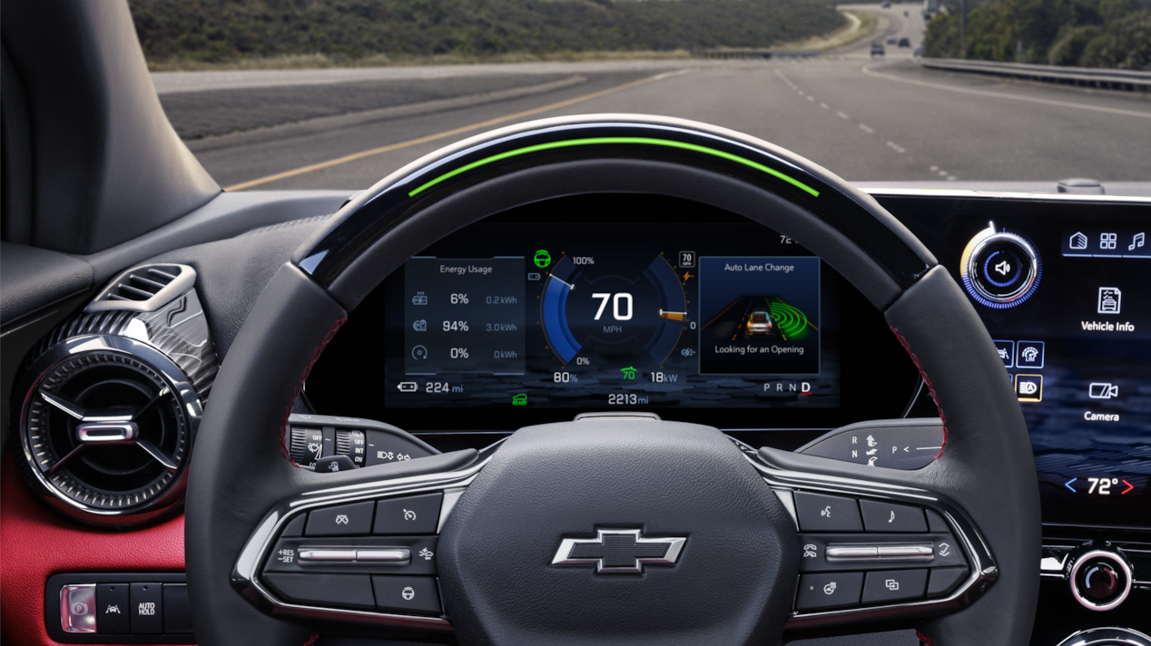 Close-up of the Top of Steering Wheel of a 2025 Chevy Blazer EV and Speedometer Displaying 70 MPH.