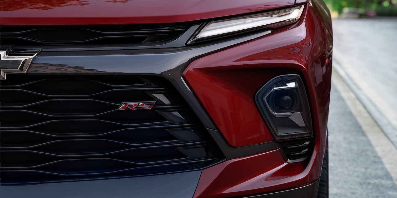 Close-up of the Grill and Front Light of a 2025 Red Chevy Blazer