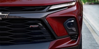 Close-up of the Grill and Front Light of a 2025 Red Chevy Blazer