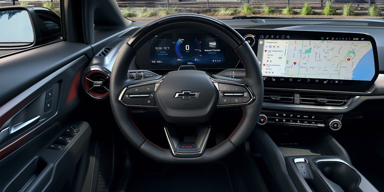 Driver’s Seat View of the Steering Wheel and Display Monitor of 2025 Chevy Equinox EV