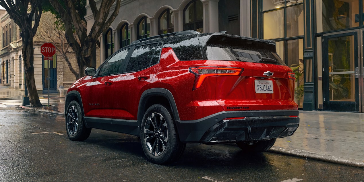 Red 2025 Chevy Equinox RS Driving on Street