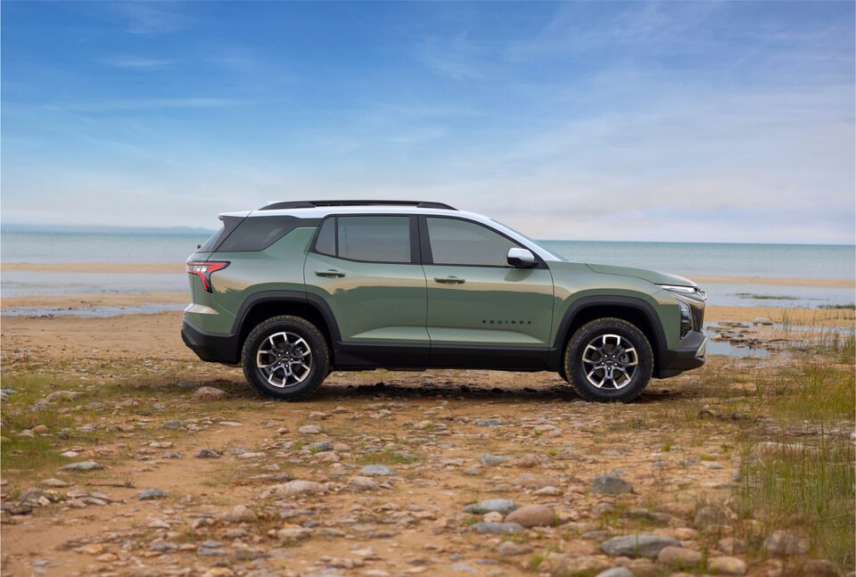Passenger Side Profile of 2025 Chevy Equinox Parked on Beach