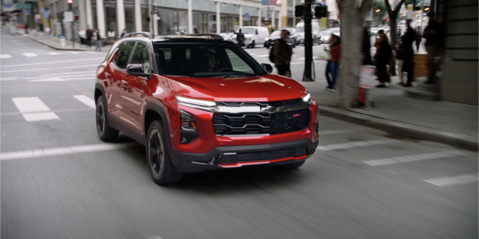 Red 2025 Chevy Equinox RS Driving on Street