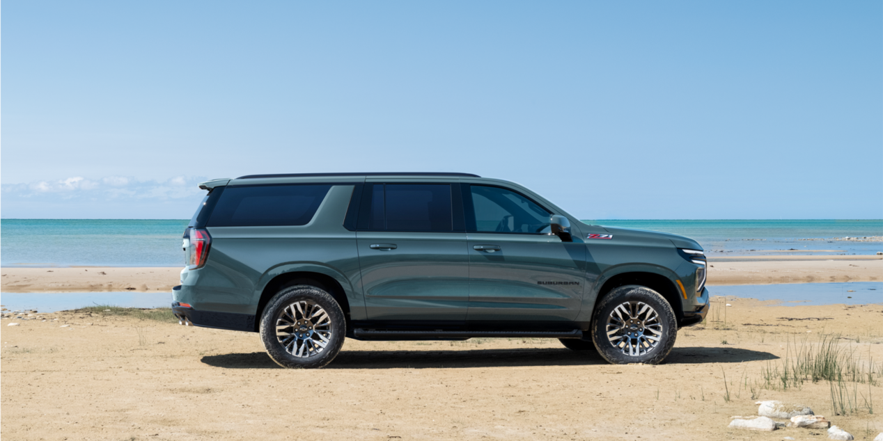 Side View of the 2025 Chevrolet Suburban Parked near the Lake