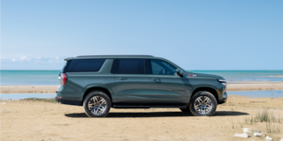 Side View of the 2025 Chevrolet Suburban Parked near the Lake
