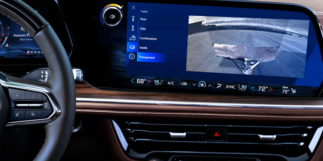 Close-up of the 2025 Chevy Suburban Infotainment System Displaying the Rear End Camera While Towing