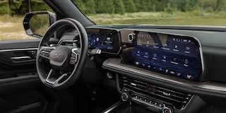 Passenger View of the Steering Wheel and Infotainment System in the 2025 Chevrolet Tahoe SUV
