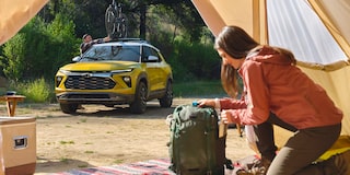 A Couple Going Camping in the Mountains with Their 2025 Chevy Trailblazer