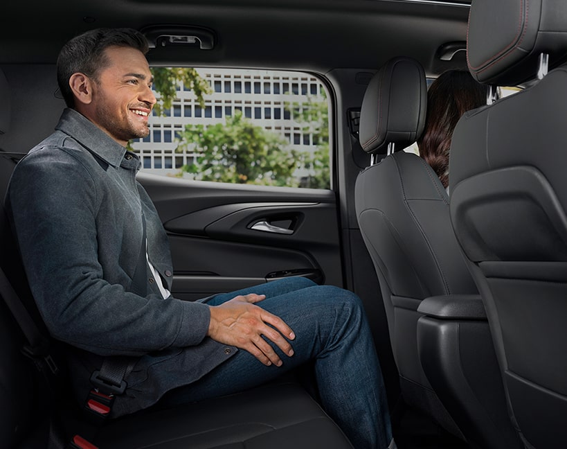 A Man Sitting in the Rear Seat of the 2025 Chevy Trailblazer
