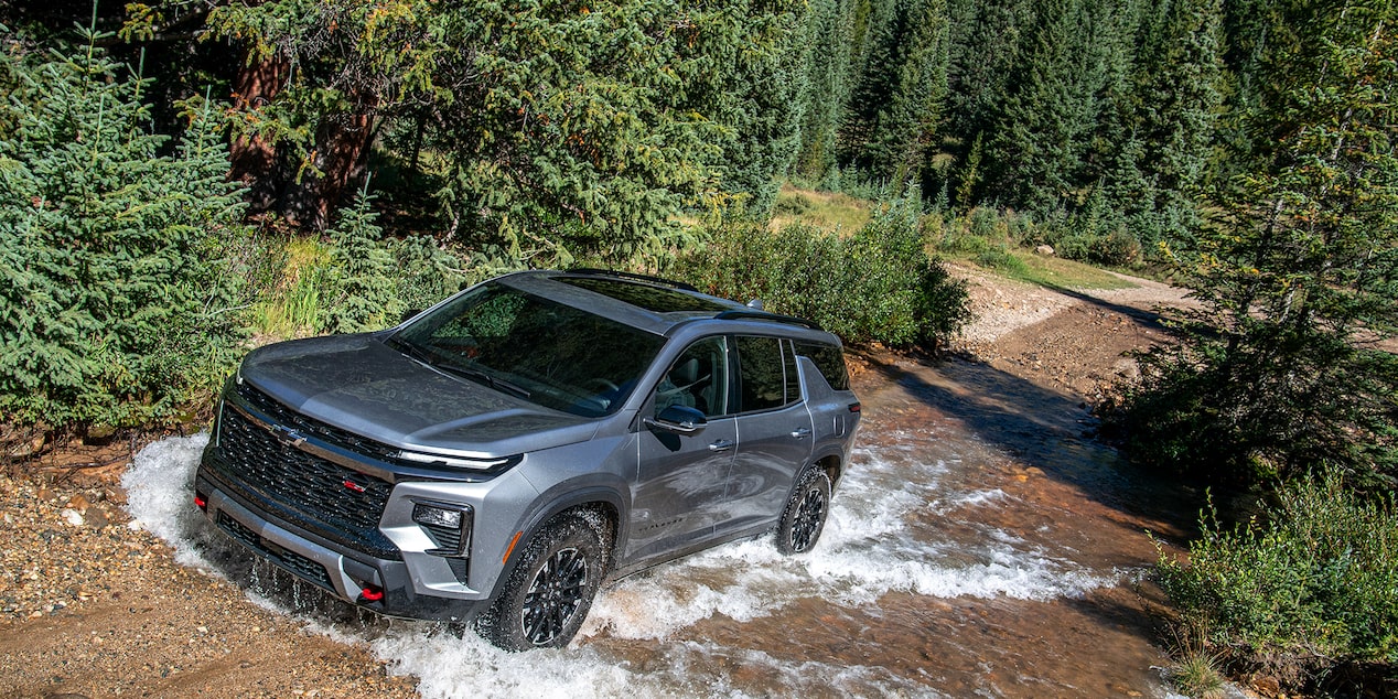 Overhead View of a 2025 Chevy Traverse Going Up a Steep Road with Water in on It.