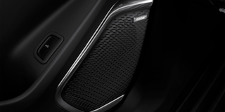 Close-up of the Speaker built into the Door of the 2025 Chevy Traverse Interior