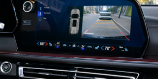 Close-up of the Dashboard Monitor with Rear View Camera Footage for Parallel Parking