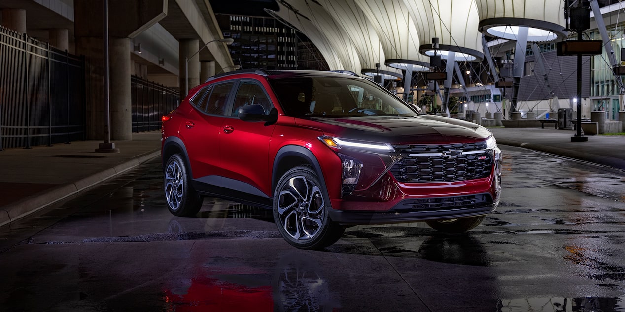 Chevy 2025 Trax Parked at Night in a Cityscape