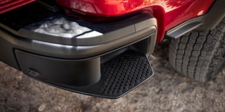 The Convenient 2025 Red Hot Chevy Colorado Built-In Trim Steps