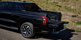 Three quarters rear view of the bed of 2025 Chevy Silverado EV on a sunny day