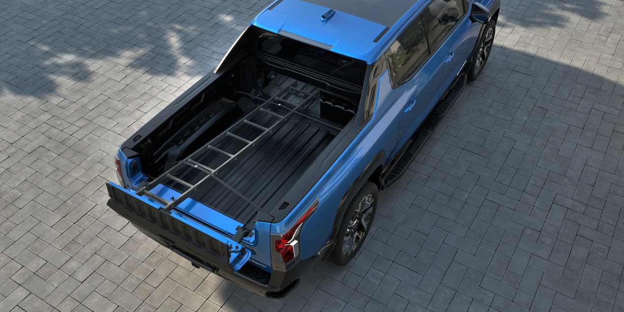 2025 Chevy Silverado EV with a Ladder in the Pickup Bed