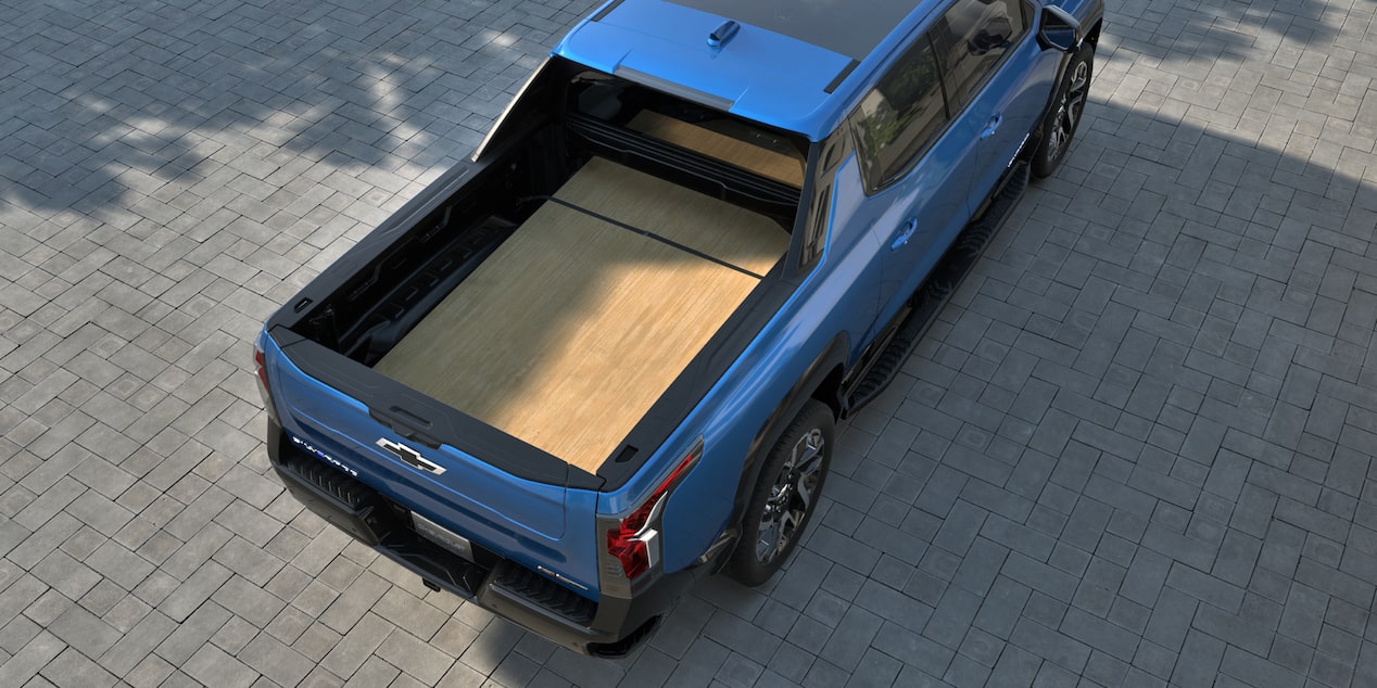 2025 Chevy Silverado EV with Lumber in the Pickup Bed