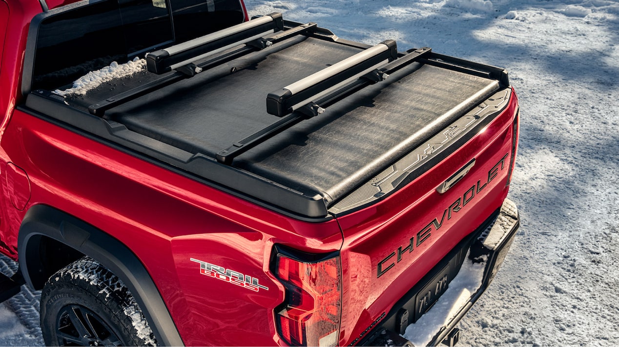 Side View of a 2025 Red Chevy Colorado with a Close-up of the Trunk
