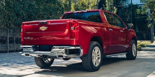 Low Rear Three Quarters View of a Red 2025 Chevy Silverado Pickup Truck