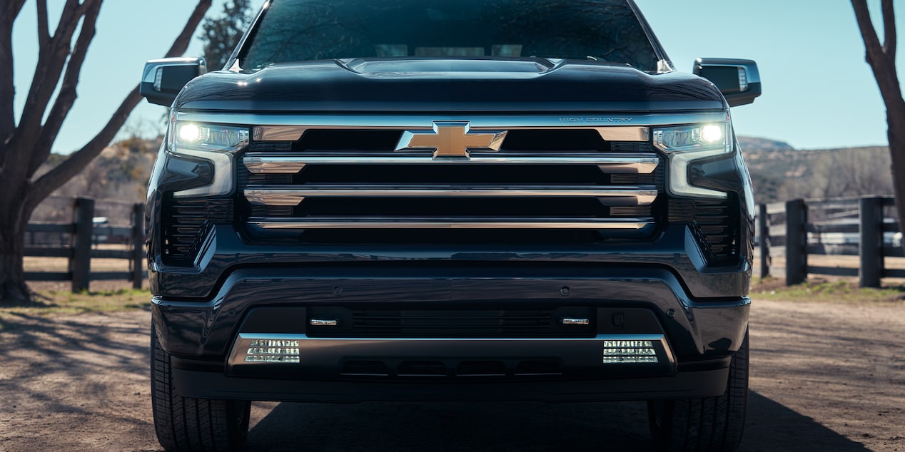 Close-up front view of a black 2025 Chevy Silverado Grille