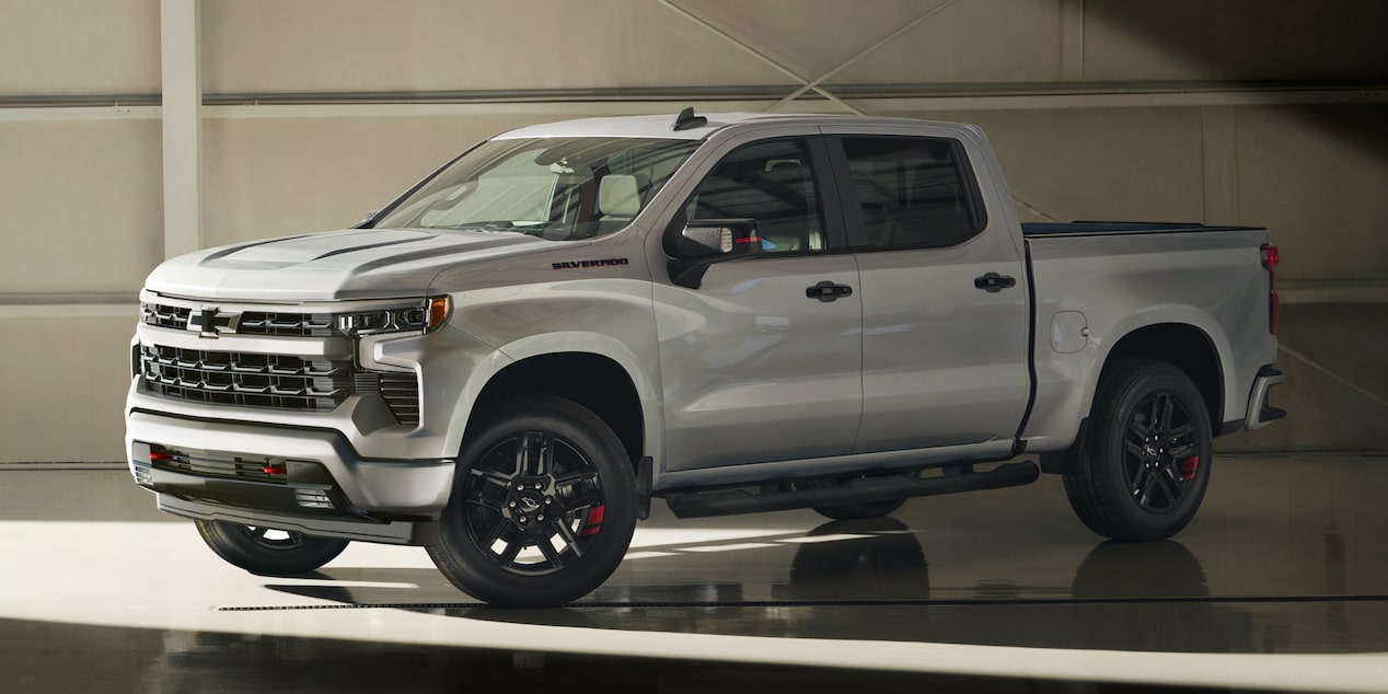 Three Quarters View of a 2025 Grey Chevy Silverado In a Garage