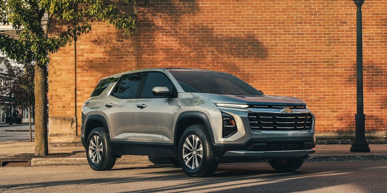 2026 Chevy Equinox Parked Near a Brick Wall in a Downtown