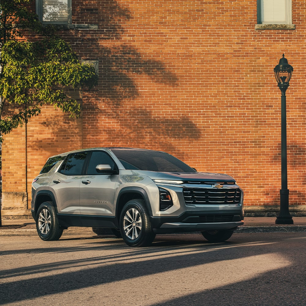 2026 Chevy Equinox Parked Near a Brick Wall in a Downtown