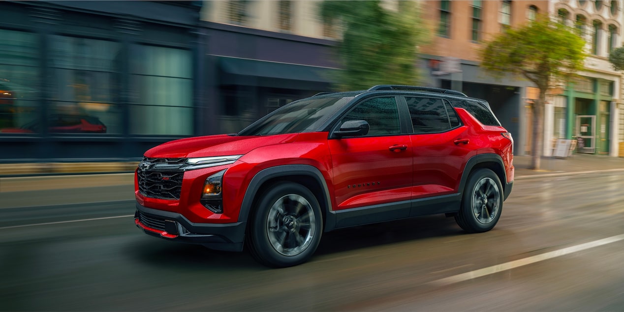 2026 Chevy Equinox Driving Through a City