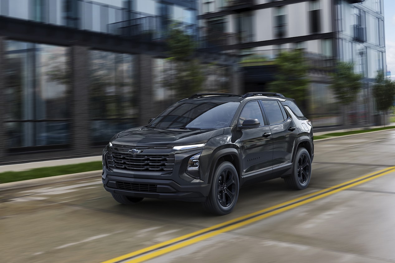 2026 Chevy Equinox Driving Through a Downtown Road