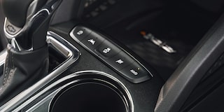 Botones de modo de conducción en el interior de la Chevy Trailblazer 2026