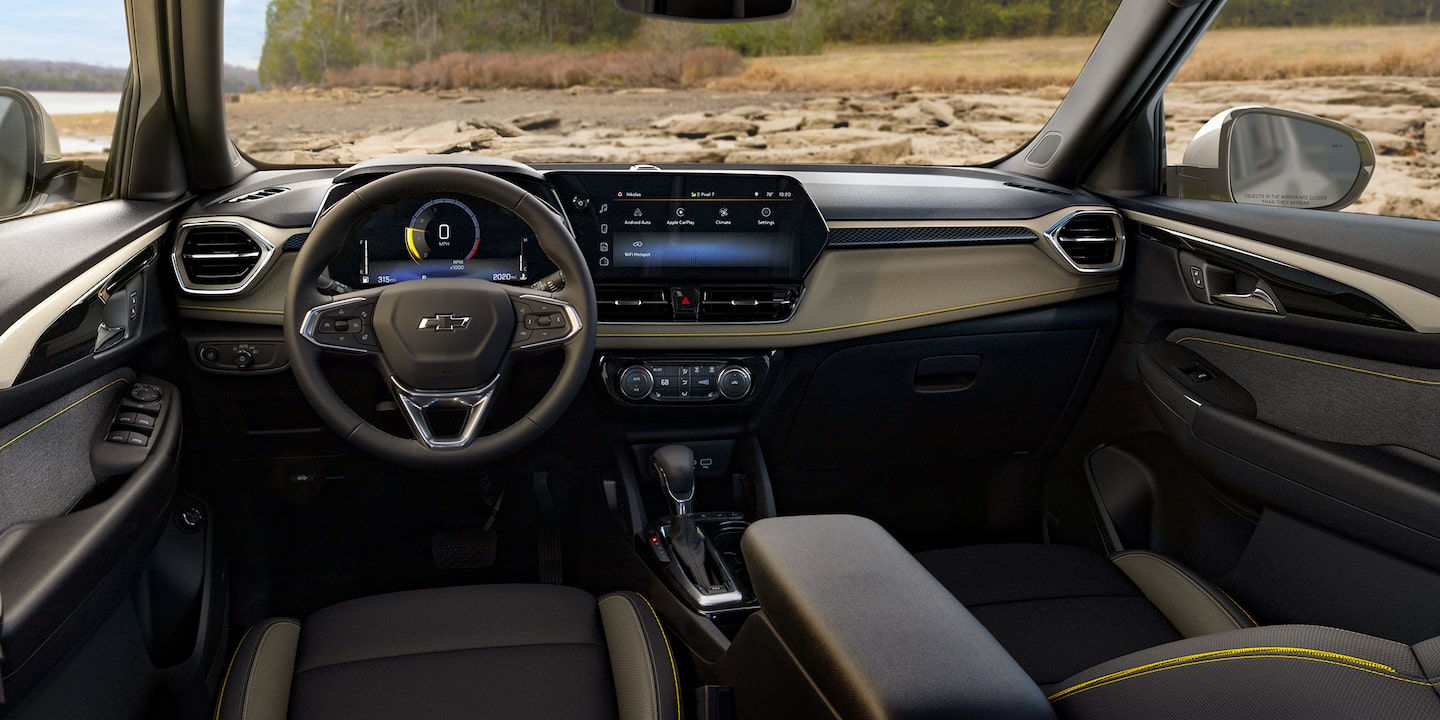 2026 Chevrolet Trailblazer ACTIV interior dashboard with 11-inch touchscreen, digital driver info, and yellow contrast stitching