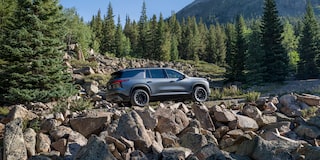 2026 Chevy Traverse Driving Off Road Up Rocky Terrain