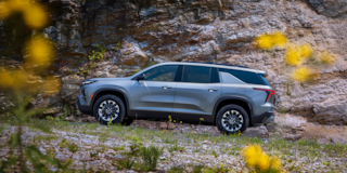 2026 Chevy Traverse Driving Off Road Up Rocky Terrain