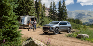 2026 Chevy Traverse Parked at a Campsite Near an RV Camper