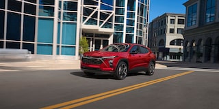 2026 Chevy Trax Driving Through a Downtown Road