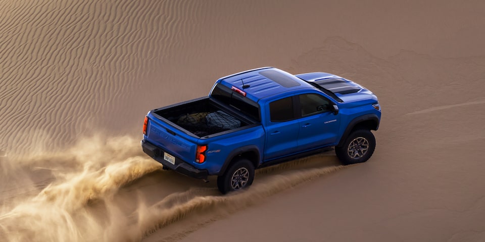 2026 Chevrolet Colorado ZR2 top-down view in sand dunes