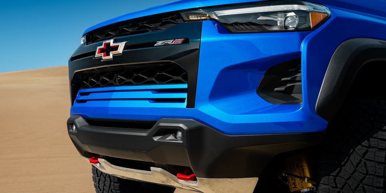 Close-up of the Front Grill of a 2026 Chevy Colorado Vehicle on a Desert