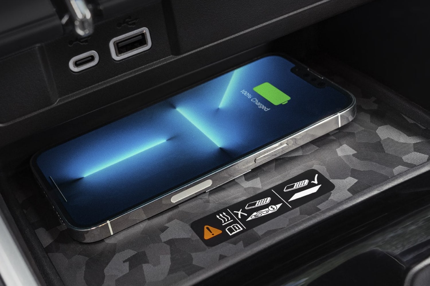 Close-up of an iPhone Put on Top of a Charging Station Next to the Driver's Seat of a 2026 Chevy Colorado