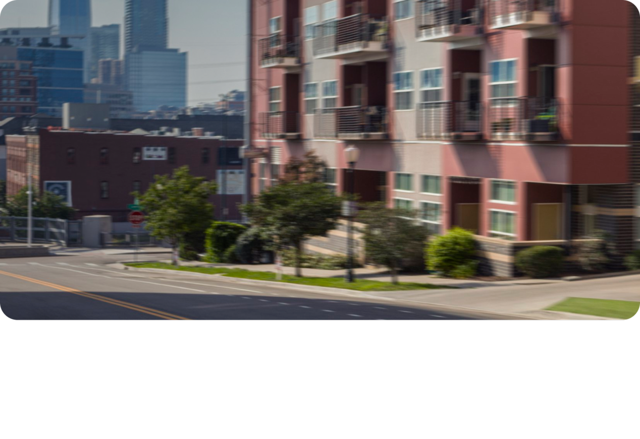 A view of a Brick Residential Building in a Downtown