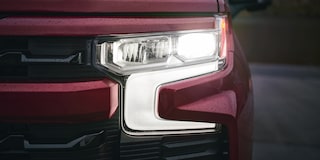 Close up view of the headlight of the 2026 Chevrolet Silverado LD.