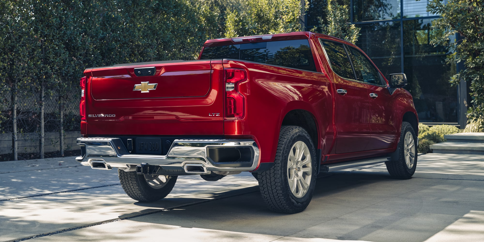 Back-side view of the 2026 Chevrolet Silverado LD Crew Cab LT parked outdoors.