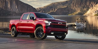 2026 Chevrolet Silverado LD Crew Cab RST parked near a dock.