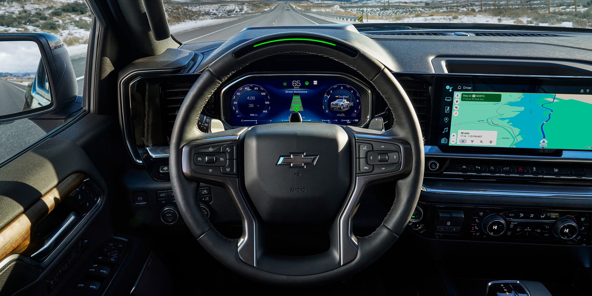 Driver's view of the steering wheel of the 2026 Chevrolet Silverado LD.